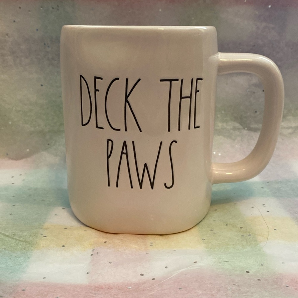 DECK THE PAWS mug